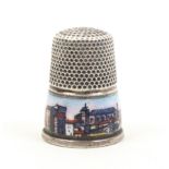 A white metal thimble with an enamel frieze with topographical view titled ïPalma de Mallorca La