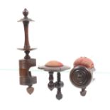 Three rosewood sewing clamps comprising an example with book form clamp below a tall reel, 26cm,