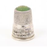 A German silver thimble the frieze depicting Belvedere Palace, Vienna, below a hardstone top