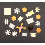Nineteen various silk winders comprising four mother of pearl snowflake examples, largest 3.5cm,