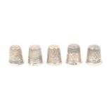 Five silver thimbles with raised border lettering comprising Stratford-upon-Avon/ James Walker