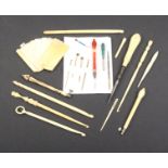 A mixed lot _ sewing _ comprising five ivory crochet hooks with carved terminals, largest 16cm,