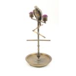 An elegant late 19th Century brass reel stand, probably French in the form of a parrot as thimble