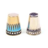 Two Norwegian silver and enamel thimbles comprising a stone top example, gilded body over blue