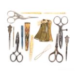 A mixed lot _ sewing _ comprising four pairs of scissors, largest 10.5cm, a straw work scissor