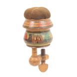 A Tunbridge ware painted whitewood sewing clamp of bulbous form, colour painted with ruined