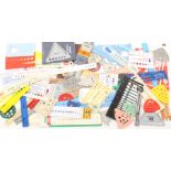 A comprehensive collection of knitting needle gauges and registers in plastic, metal and cards