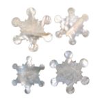 Four large Chinese engraved mother of pearl star form silk winders all with figural and floral