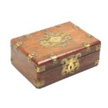 A late 19th Century rosewood and brass mounted rectangular box, brass escutcheon and lid panel
