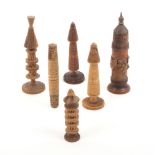 Six late 19th Century Tyrolean needlecases with chip carved and turned decoration, five of