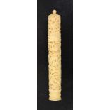 A good 19th Century Canton carved ivory netting case of tapering cylinder form carved with dragon,