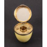 A silver and yellow enamel thimble egg etui by Asprey London and hallmarked for Chester, 1910,