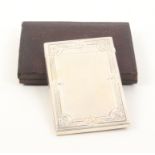 A Victorian silver visiting card case, hinged cover, engraved monogram to one side, the engine