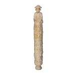 A fine figural carved ivory needlecase of cylinder form, the upper section carved as a woman wearing