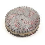 A large 18th/early 19th Century Indian or Persian steel pincushion of two domed circular panels