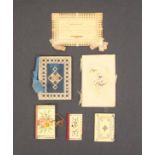 Six needlebooks comprising a pierced card and ink inscribed example ñTo My Sisterî, 9 x 6cm, another