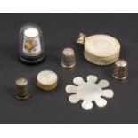 A mixed lot – sewing comprising an engraved Chinese snowflake silk winder, 5cm, a mother of pearl