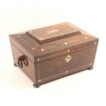 A rosewood sarcophagal form sewing box, circa 1860, with pewter line and mother of pearl decoration,