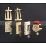 Four 19th Century Chinese ivory sewing clamps, all variously carved comprising a pin cushion