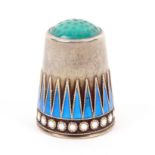 A Norwegian silver and enamel thimble by Marius Hammer, green stone top over a border of blue enamel