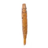 An 18th Century fruitwood short knitting stick carved with a scene of St George slaying the dragon