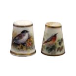 Two Royal Worcester puce mark thimbles, the first painted with a bird amid flowers between gilt