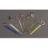 Ten metal and glass lace bobbins mostly 19th Century, comprising five brass bobbins one with ‘