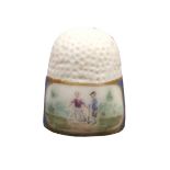 An 18th Century porcelain thimble probably French, the powder blue frieze between gilt lines with