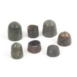 Seven early excavated bronze thimbles including two of ring form, circa 1356 – to 1450 (7) All