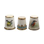 Three Worcester porcelain thimbles comprising a jewelled and gilded example, and two Royal Worcester