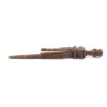 A 19th Century carved and stained knitting stick, probably Welsh, of twin prong for with flat