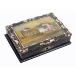 A papier mache rectangular sewing box, circa 1860, the lid with overhanging shaped border and