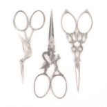 Three pairs of 19th Century steel scissors, comprising a pair with one arm as a bird, the other as a