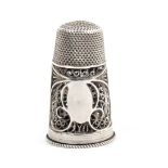 An English silver filigree scent bottle/thimble circa 1820 oval vacant cartouche within quill work