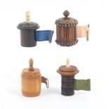 Four tape measures comprising a French carved boxwood and clouté work example, slightly reduced