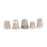 A mixed lot – sewing comprising three silver thimbles including a ‘James Walker The London