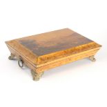A large Regency period painted sarcophagal form card/games box, the lid painted with a mountainous