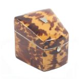 A tortoiseshell double needle packet box sloping lid and sides, former with white metal tablet,