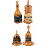 Mauchline ware – sewing – four tape measures comprising a bottle form example (The Famous Hairpin