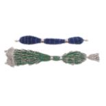 Two 19th Century knitted and steel beaded misers purses, one in green with elaborate bead work and