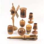 Mauchline ware – foreign imports – nine pieces comprising an unusual standing windmill operated by a