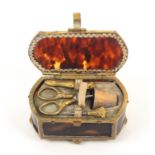 A miniature tortoiseshell sewing box for a child or doll, circa 1880, of curved end rectangular form