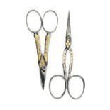 Two pairs of 19th Century scissors comprising a fine steel pair circa 1820, short tapering blades,