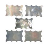 A set of five 19th Century Mother of pearl silk winders of shaped rectangular outline, 5cm (5)