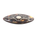 A good tortoiseshell and silver inlaid shuttle, circa 1800, each side with an engraved oval
