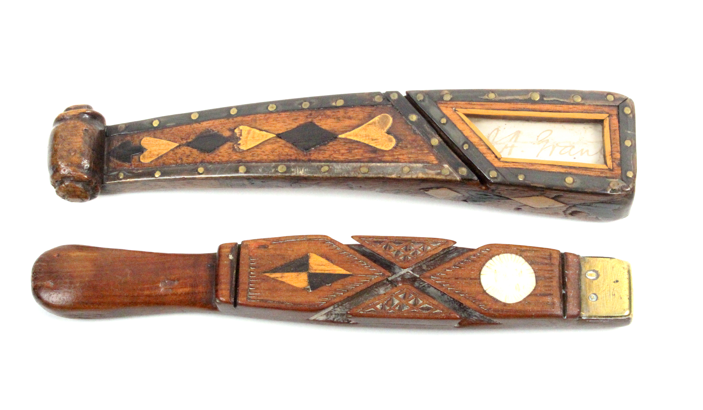 Two 19th Century knitting sticks, comprising a mahogany carved scroll example, Durham, inlaid with