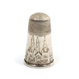 A scarce early 19th Century English silver pictorial thimble of unusually tall form depicting