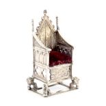 A silver pin cushion in the form of the Coronation throne from Westminster Abbey, London 1910 by