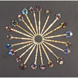 Twenty one 19th Century turned bone lace bobbins mostly with pewter and other metal inlays including