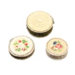 Three bone disc form pin cushions, comprising a painted floral example ‘A Trifle from Redcar’, 3.